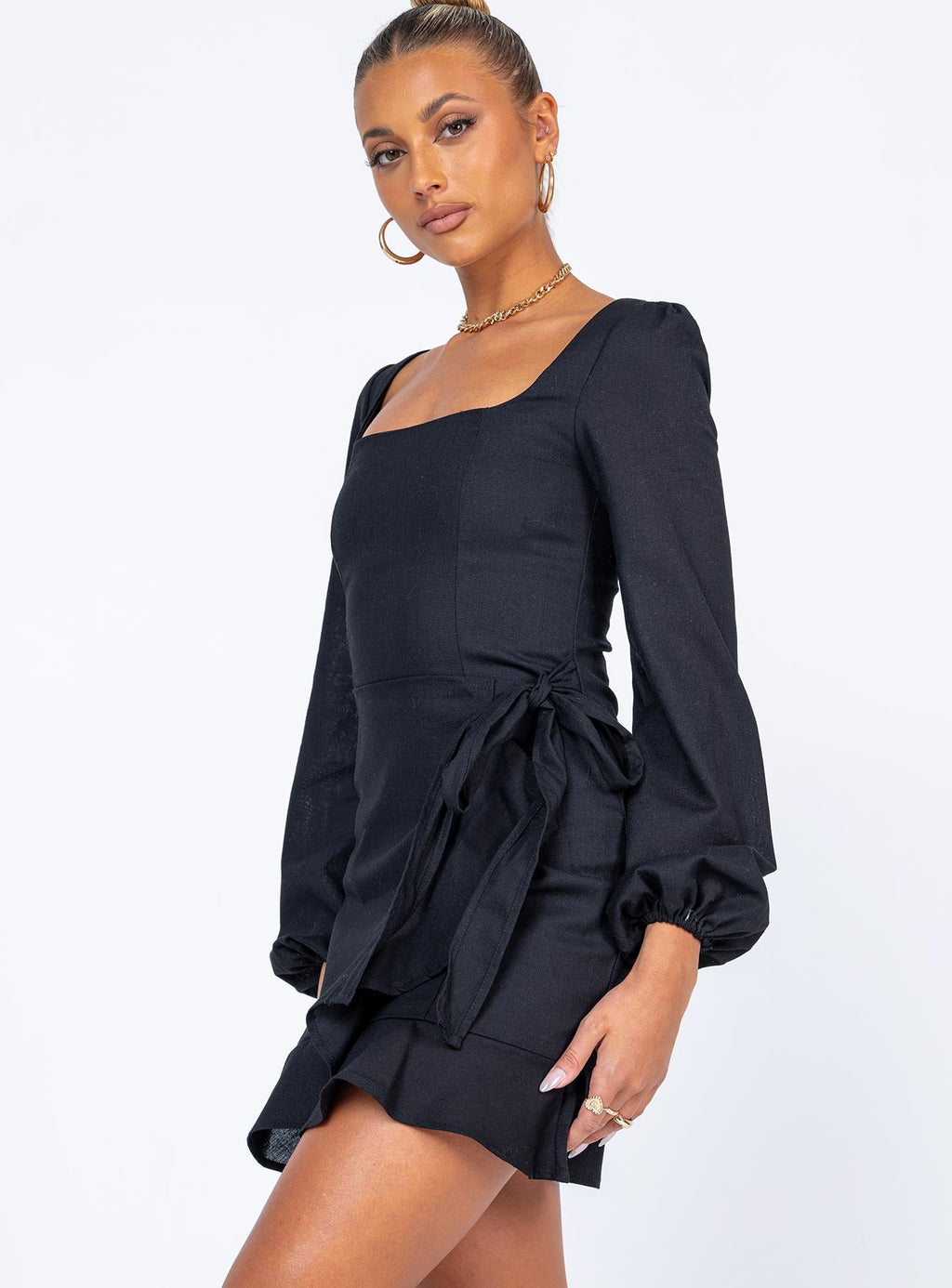 side view of model wearing Princess Polly The Villa Mini Dress Black